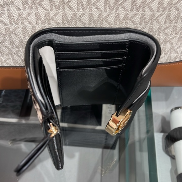 MICHAEL KORS
Carmen Medium Flap Bifold Faux Fur-Leather Wallet
Black
NWT - Picture 10 of 16